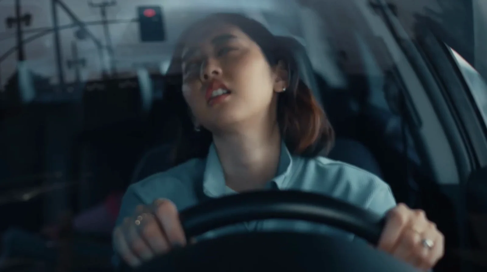 TurboTax GenAI Mobile Experiences video preview showing a customer in her car